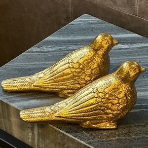 Elegant gold  bird statues figurines by Global Views.  Set of 2